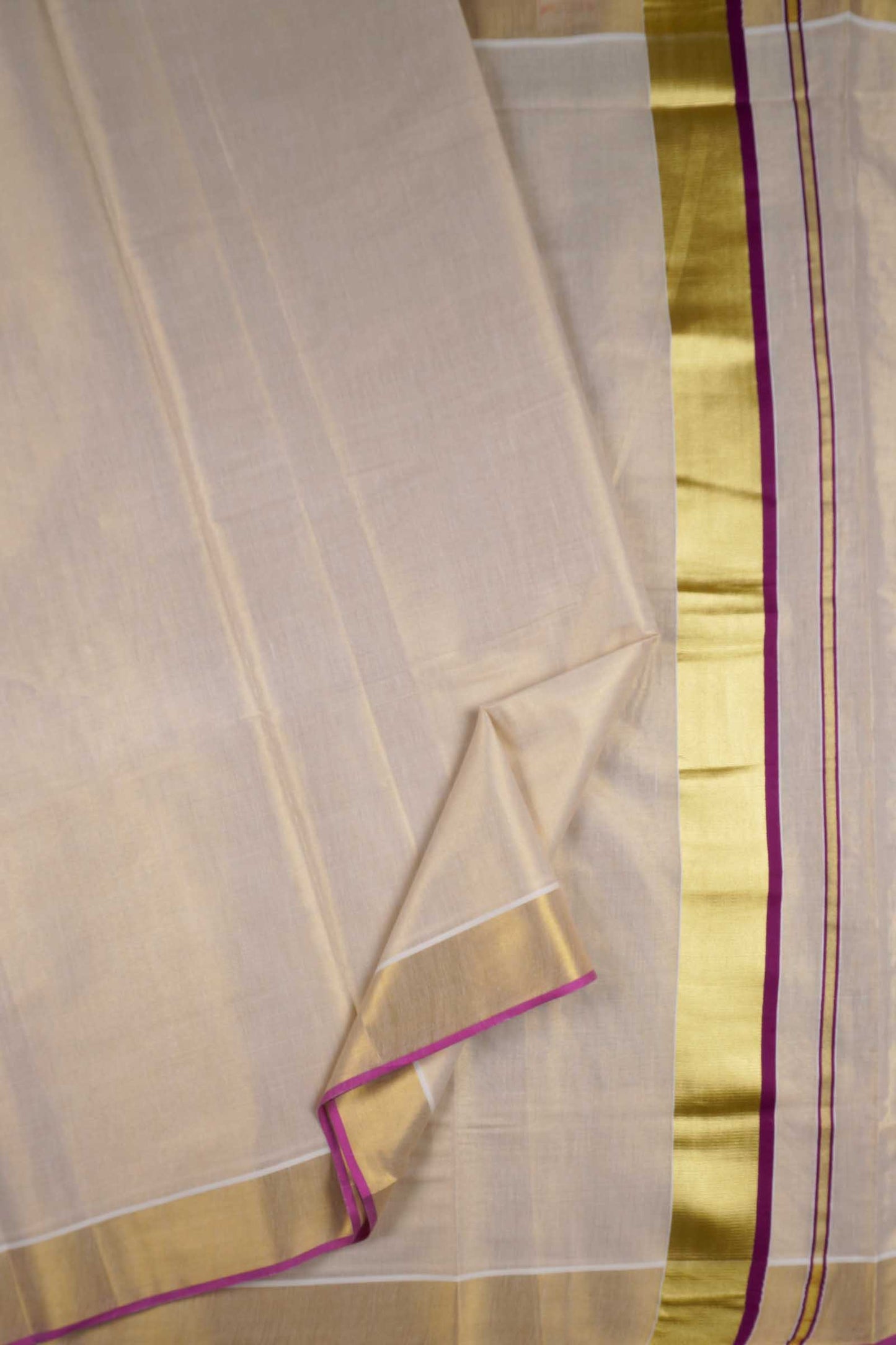 Off White Kerala Fancy Tissue Cotton Golden Zari Pallu Pink Border Saree