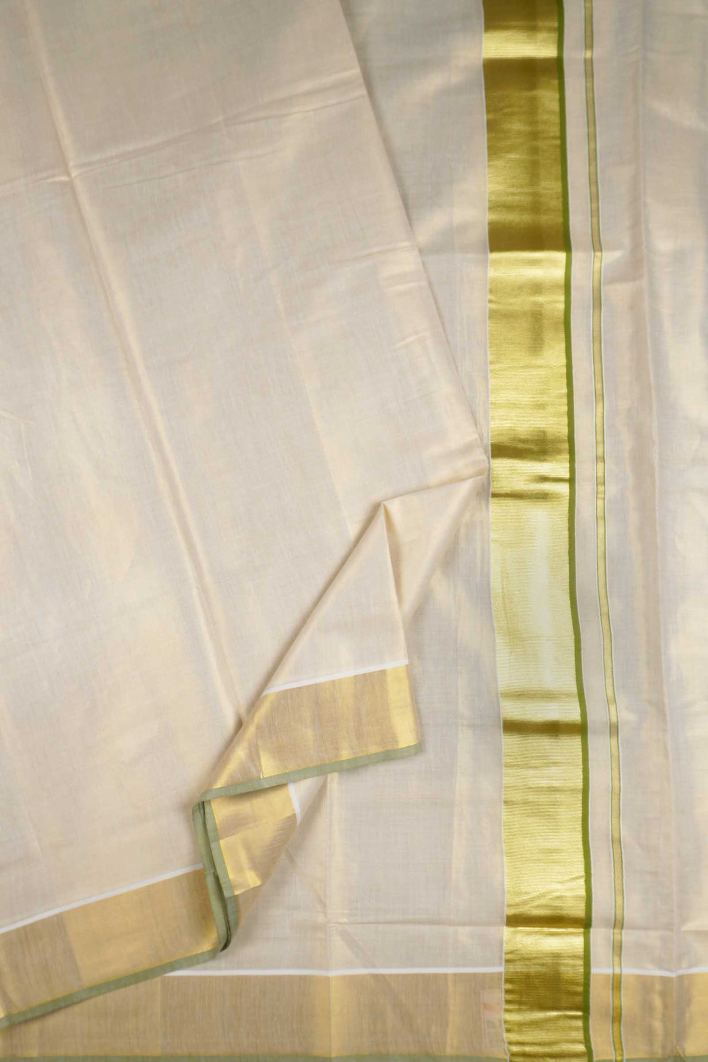Off White Kerala Tissue Cotton Golden Zari Pallu Green Border Saree