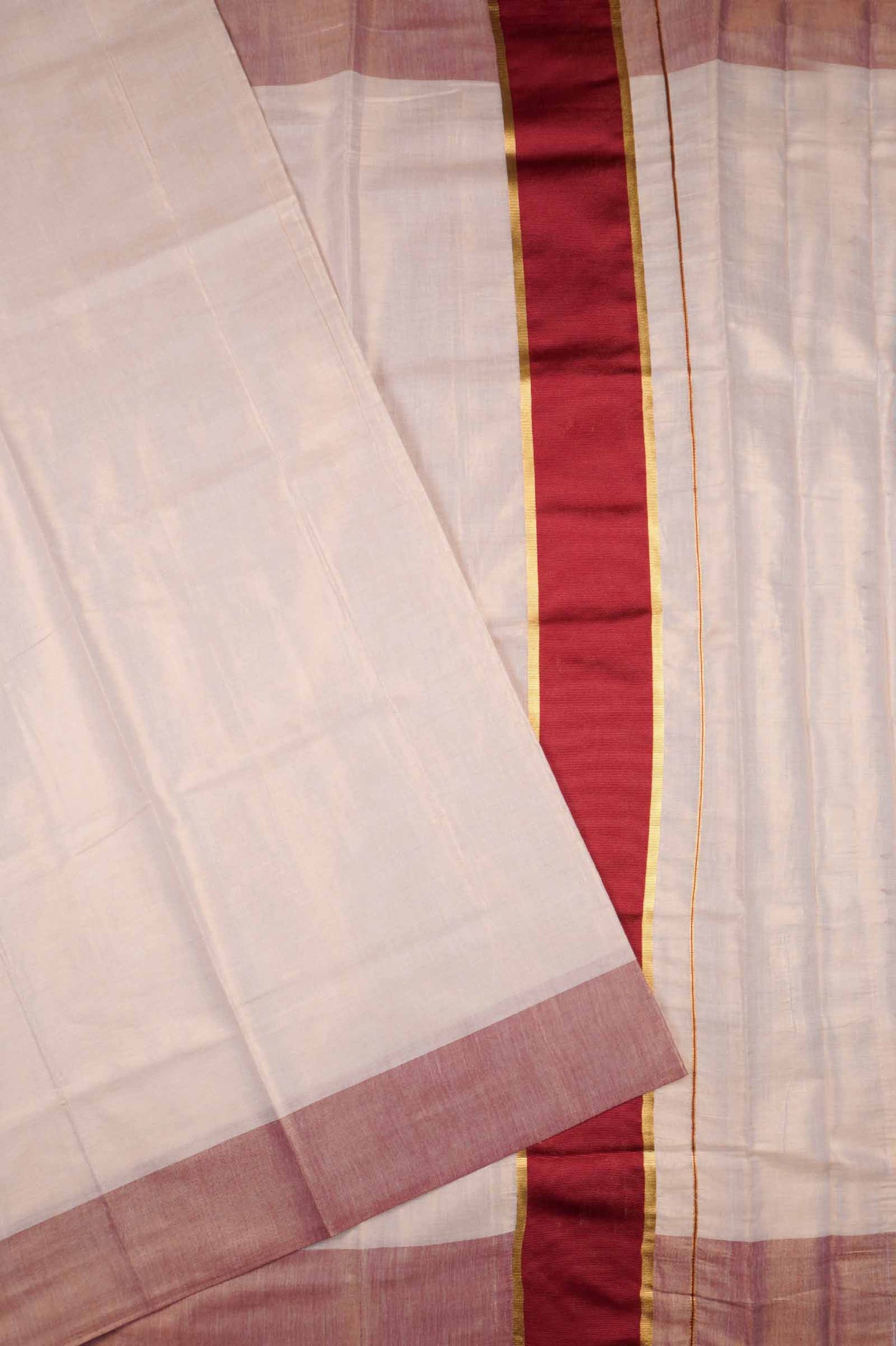 Off White With Maroon Kerala Tissue Cotton Golden Zari Line Saree
