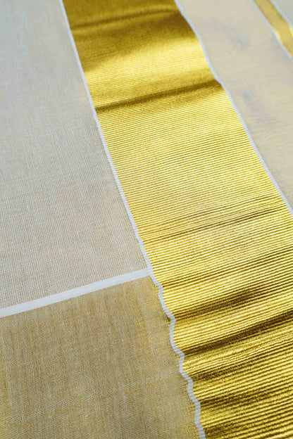 Off White Kerala Tissue Cotton PaiselyTower Butta Golden Zari Line Saree