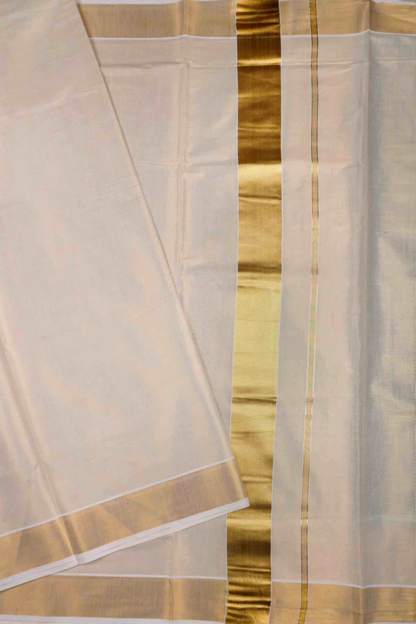 Off White Kerala Tissue Cotton PaiselyTower Butta Golden Zari Line Saree