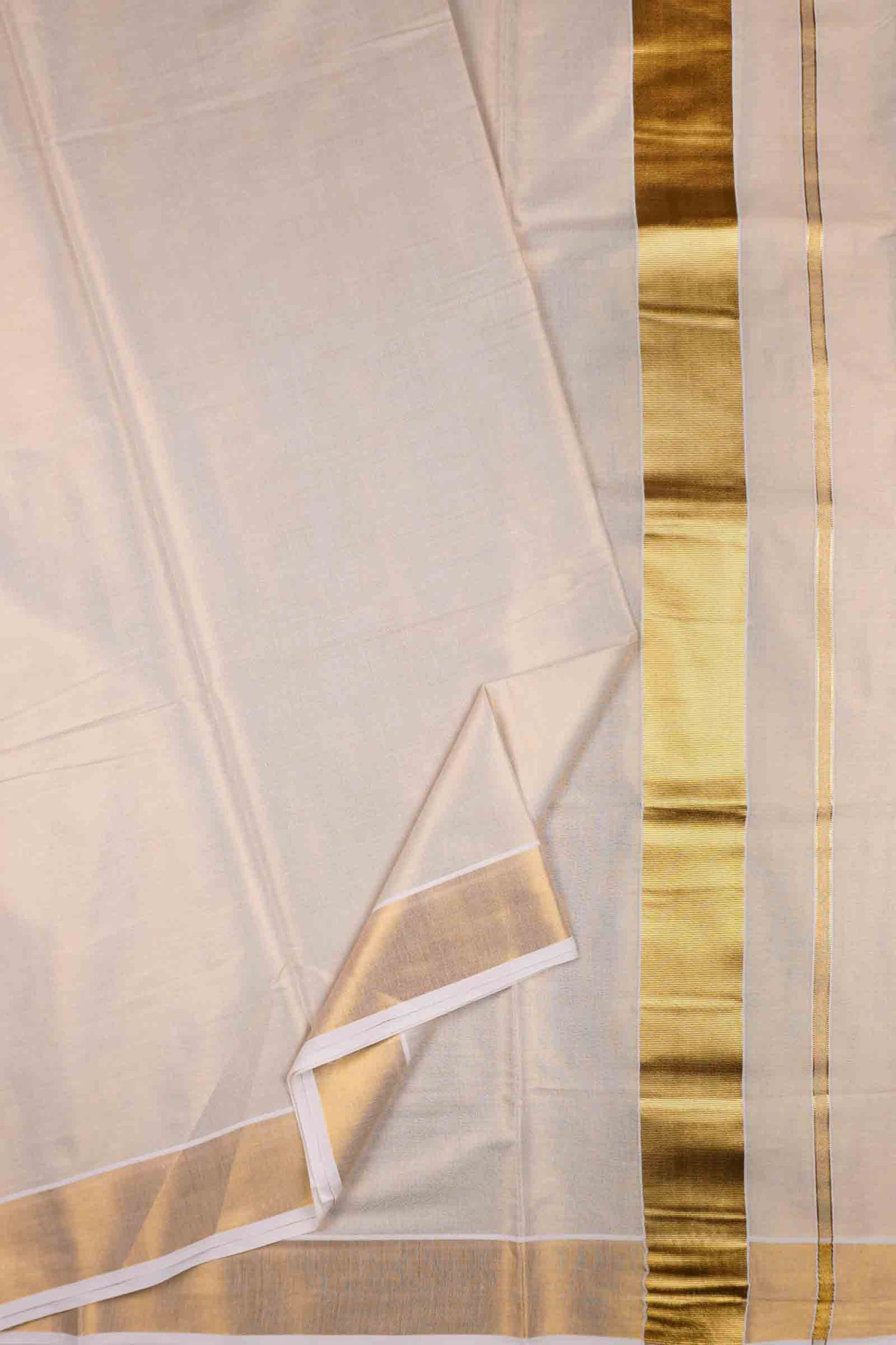 Off White Kerala Tissue Cotton PaiselyTower Butta Golden Zari Line Saree