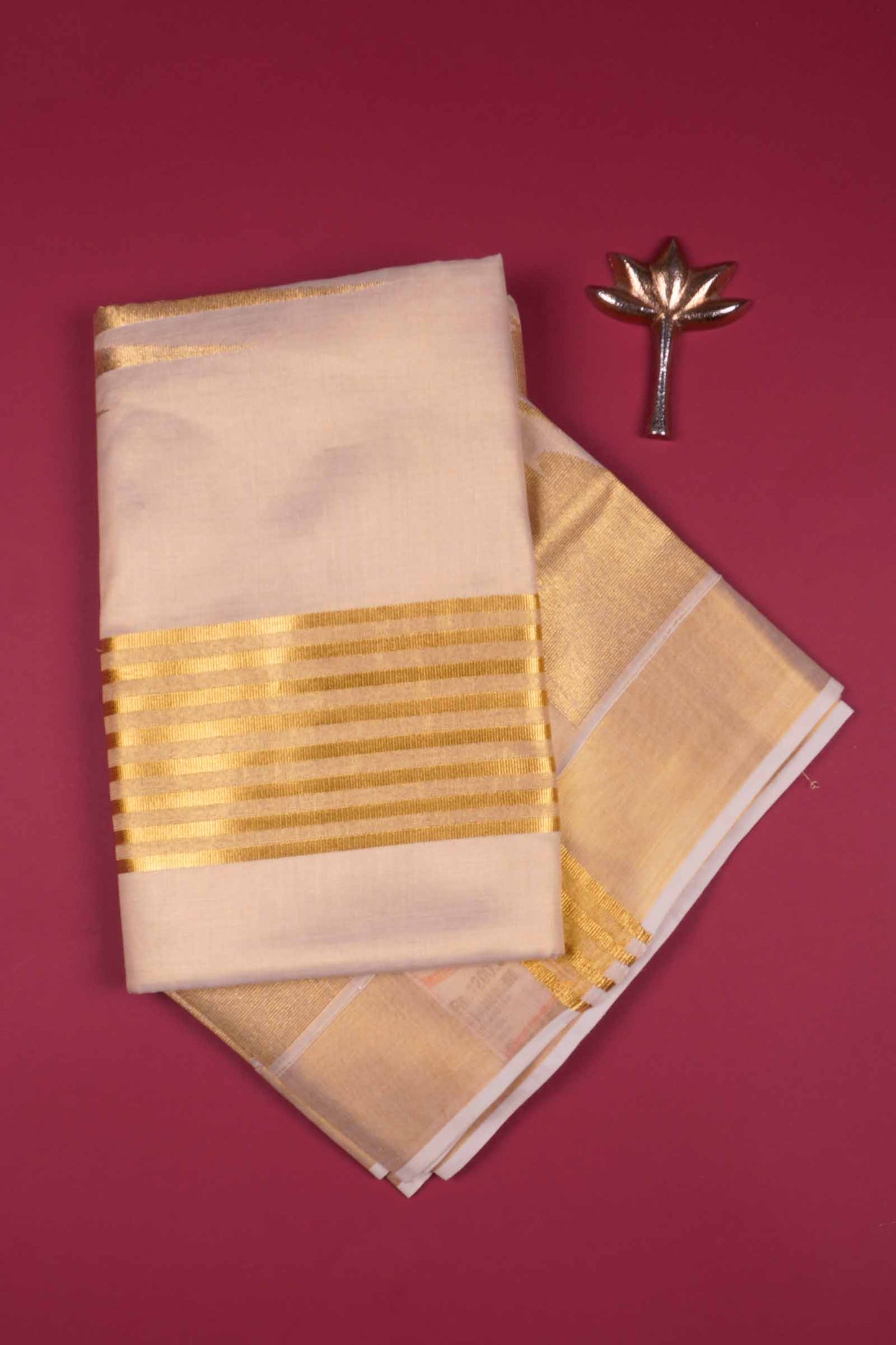 Off White Kerala Tissue Cotton Golden Temple Border Saree