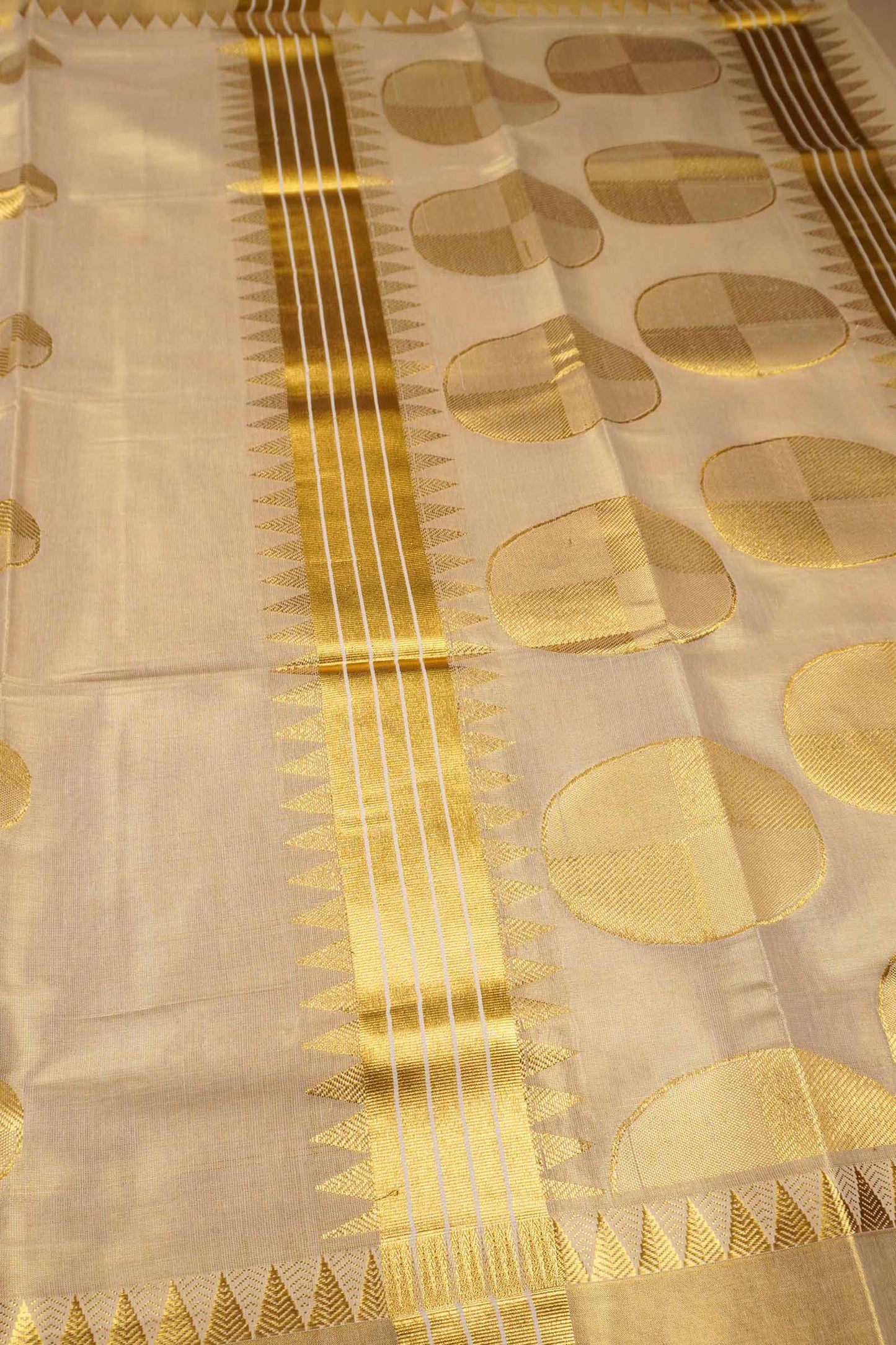 Off White Kerala Tissue Cotton Temple Border Golden Moon Pallu Saree