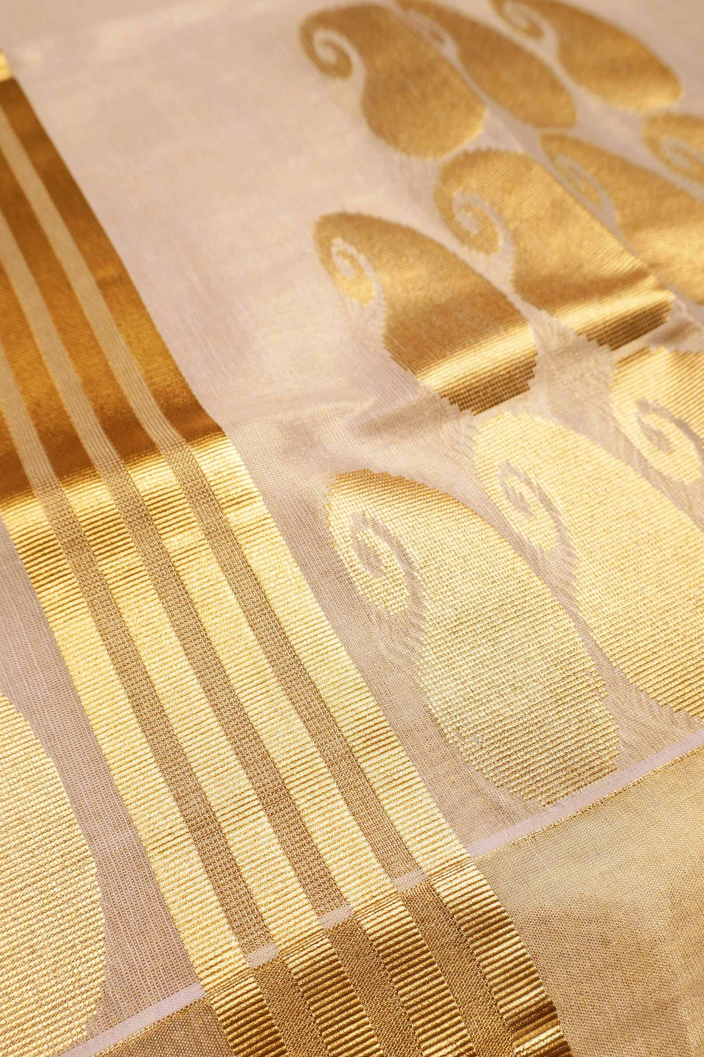 Off White Kerala Tissue Cotton Paisley Tower Butta Saree