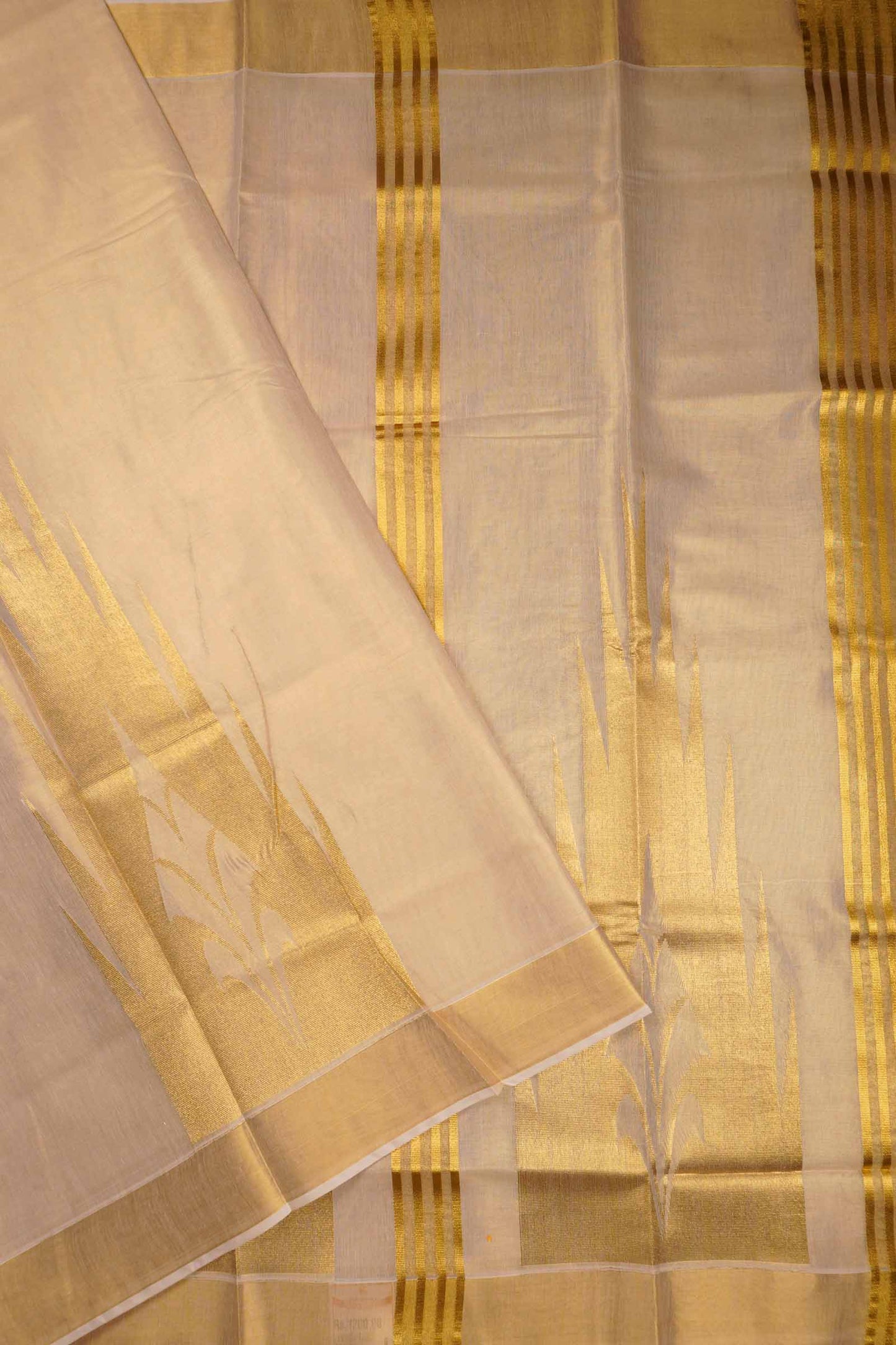 Off White Kerala Tissue Cotton Golden Temple Border Saree