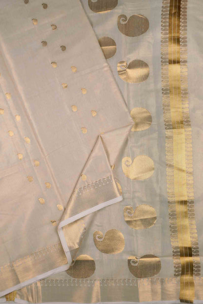 Off White Kerala Tissue Cotton Mango Butta Golden Zari Line Saree