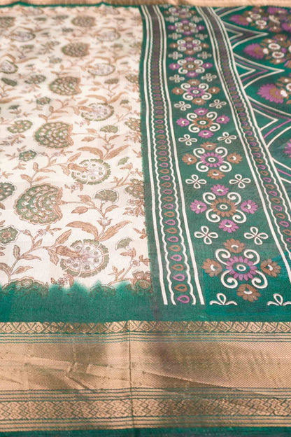 Off White Printed Cotton Floral Power Green Zari Border Saree