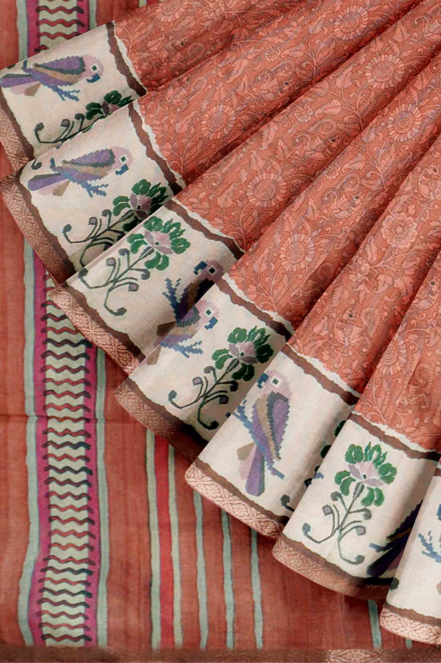 Orange Semi Tussar Blooming Magic Prints Parrot Border Saree
