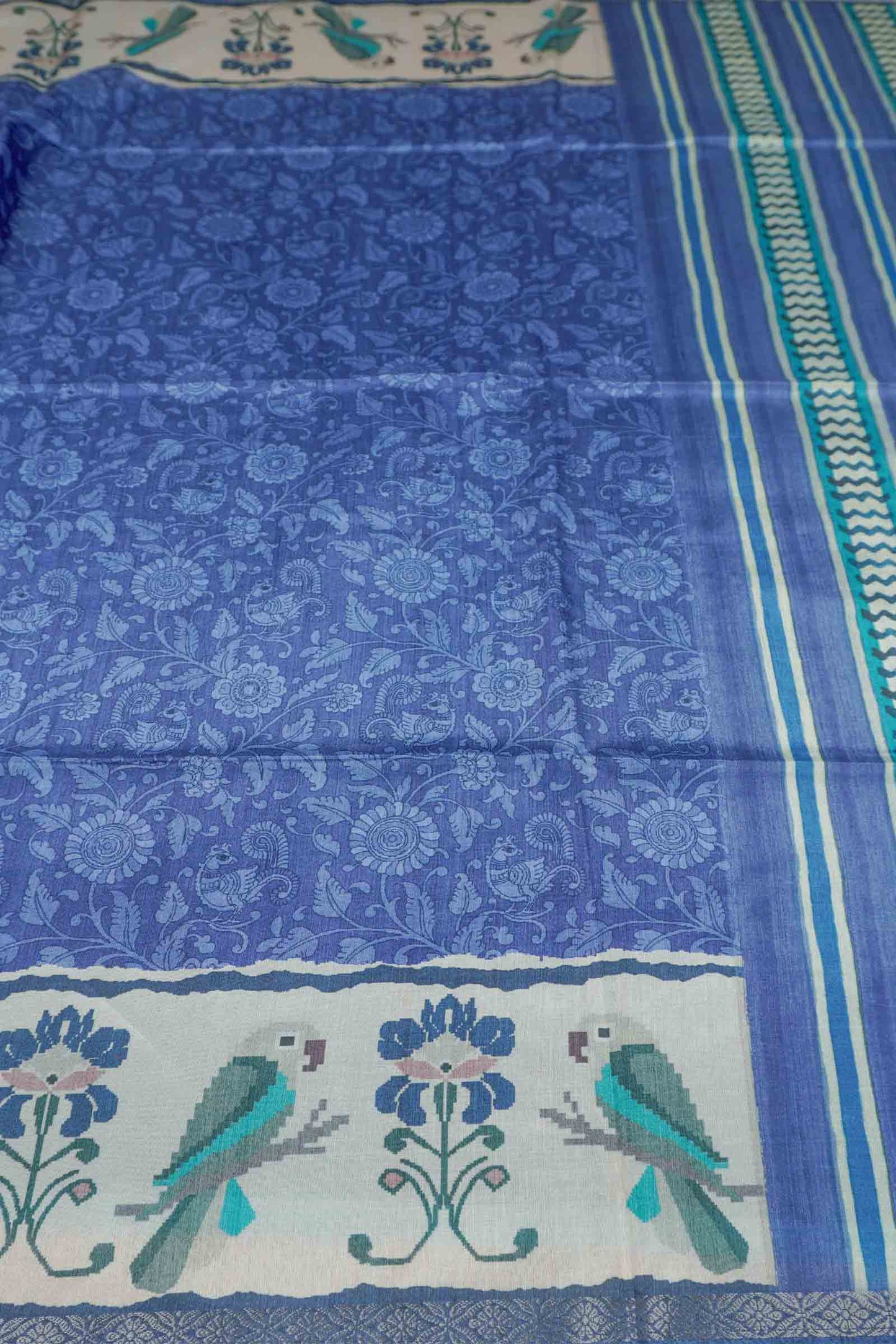 Blue Semi Tussar Blooming Magic Prints Parrot Border Saree