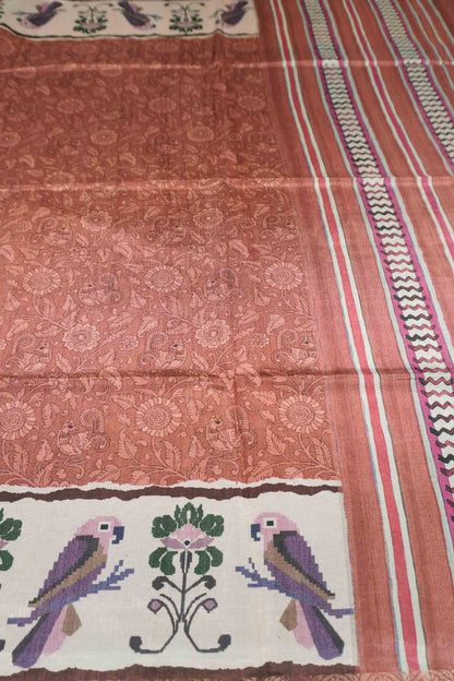 Orange Semi Tussar Blooming Magic Prints Parrot Border Saree