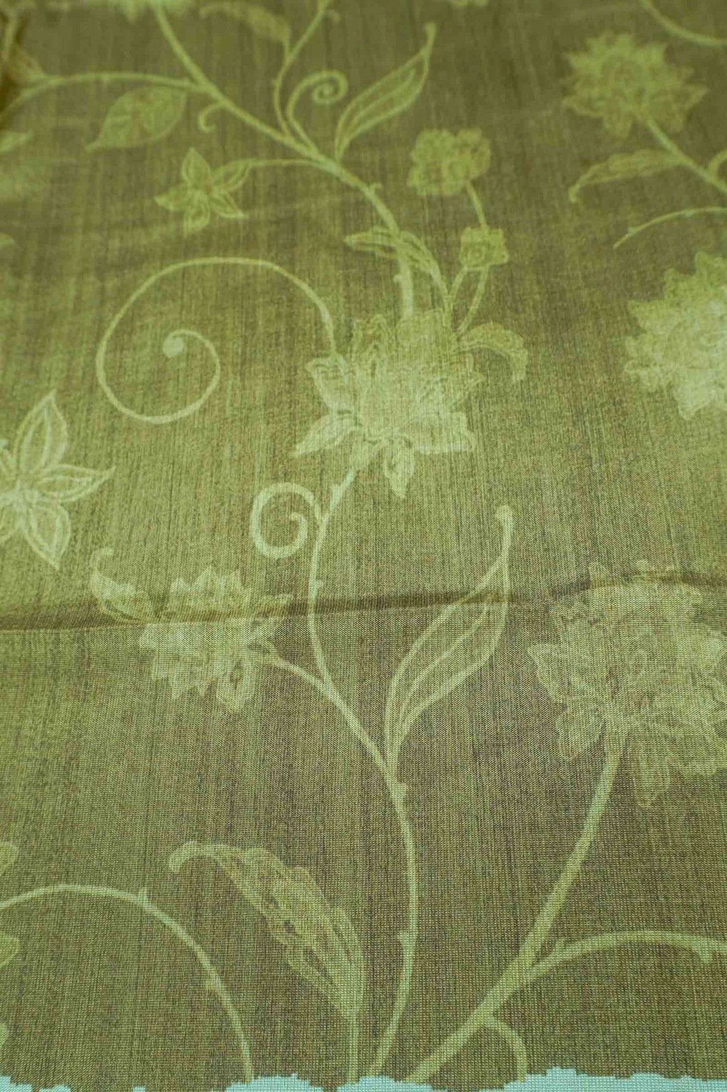 Olive Green Semi Tussar Blooming Magic Prints Crane Border Saree