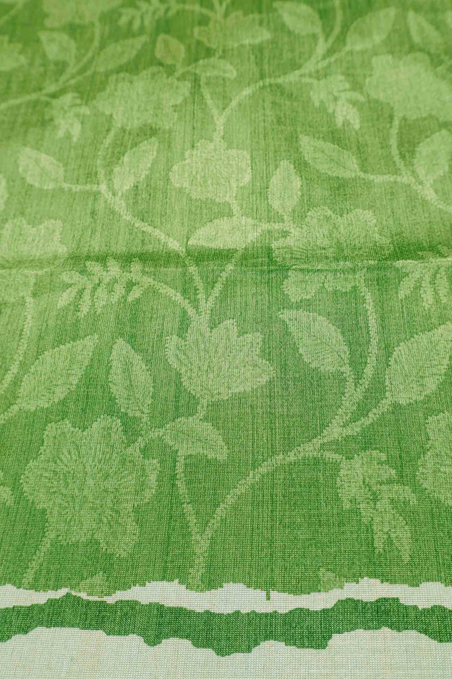 Bright Green Semi Tussar Blooming Magic Prints Crane Border Saree
