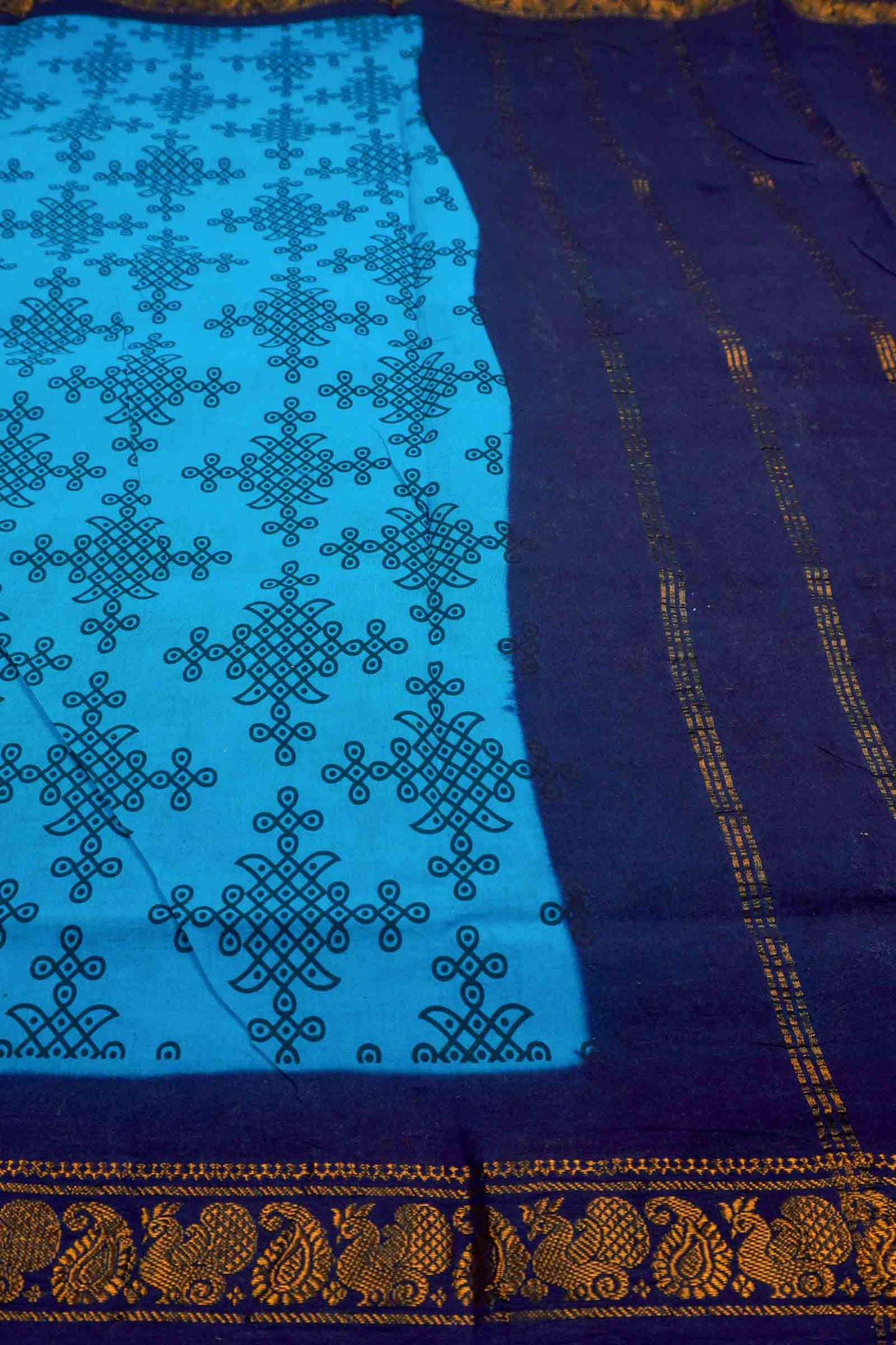 Dark Sky Blue Sungudi With Rangoli and Zari Border Saree