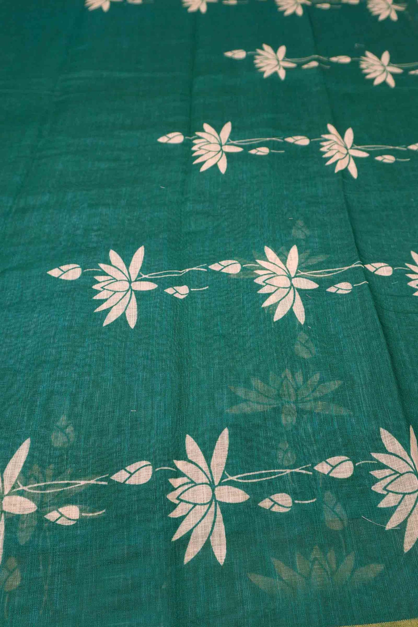 Green Semi Linen Regal Lotus Printed Zari Border Saree
