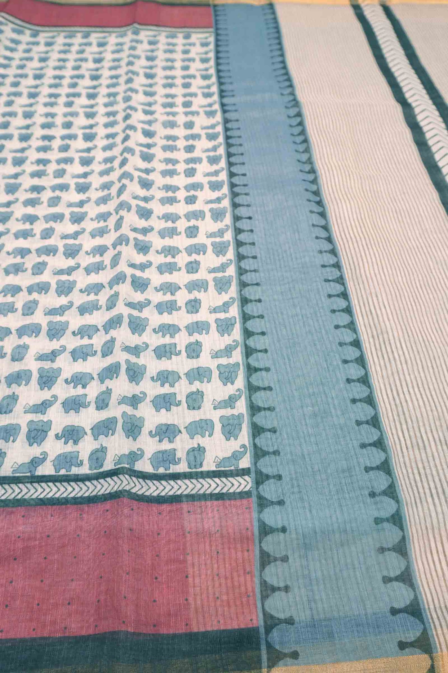 Off White Semi Linen Elephant Printed Zari Border Saree