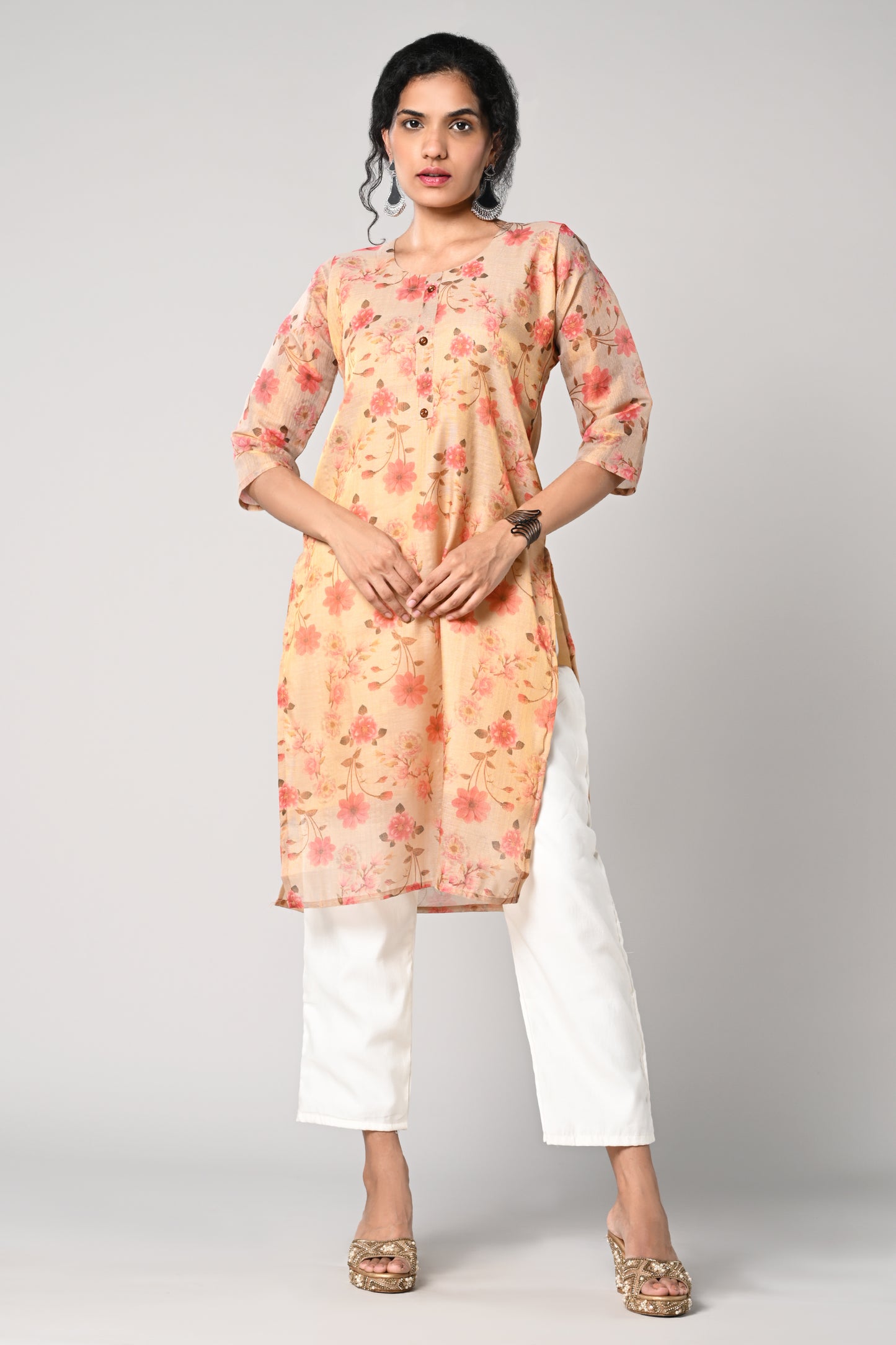 straight top,
floral prints all over the body,
round neck &amp; 3/4 sleeves,
shimmer material.