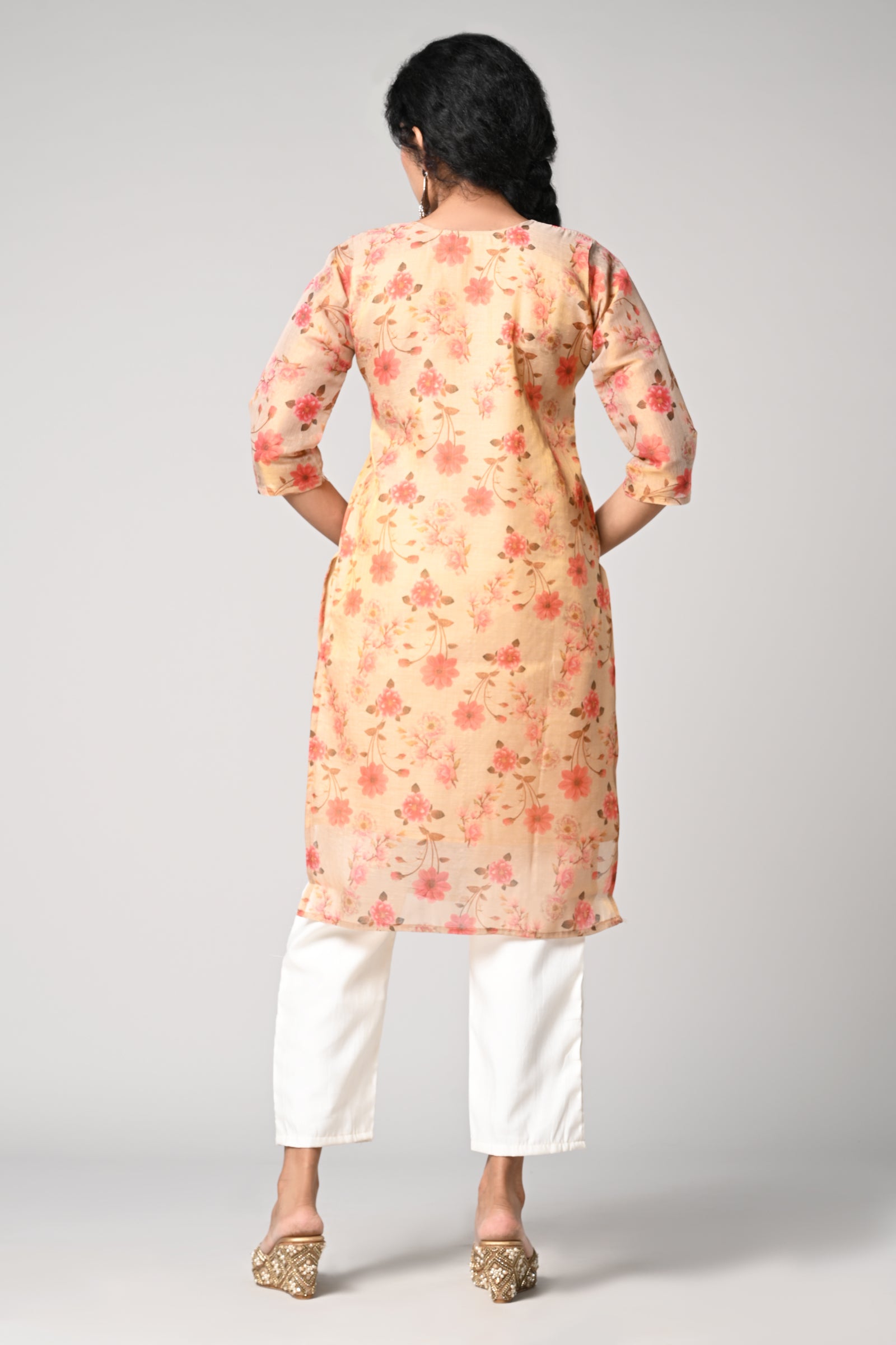 straight top,
floral prints all over the body,
round neck &amp; 3/4 sleeves,
shimmer material.