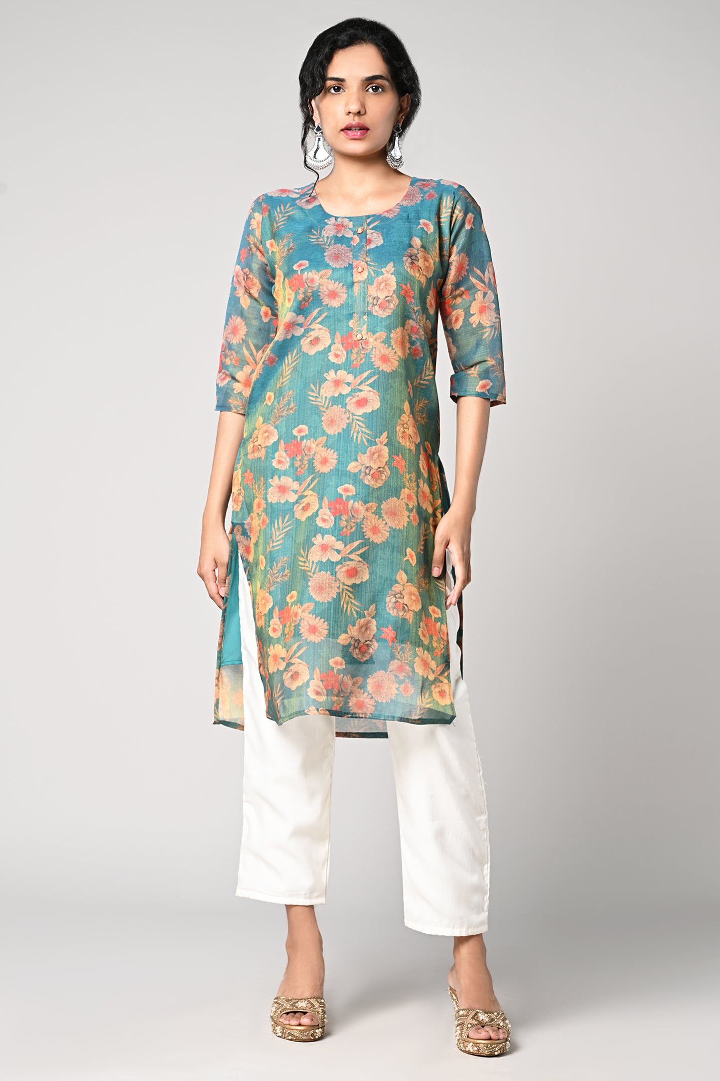 straight top,
floral prints all over the body,
round neck &amp; 3\4 sleeves,
shimmer material.