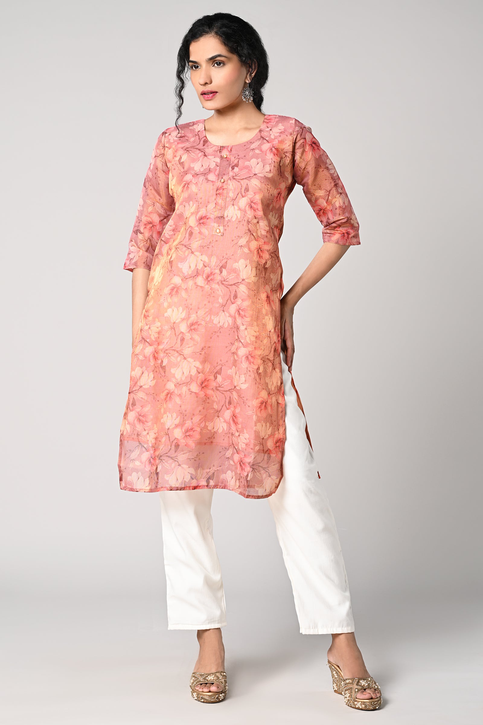 straight top,
floral prints all over the body,
round neck &amp; 3/4 sleeves,
shimmer material.