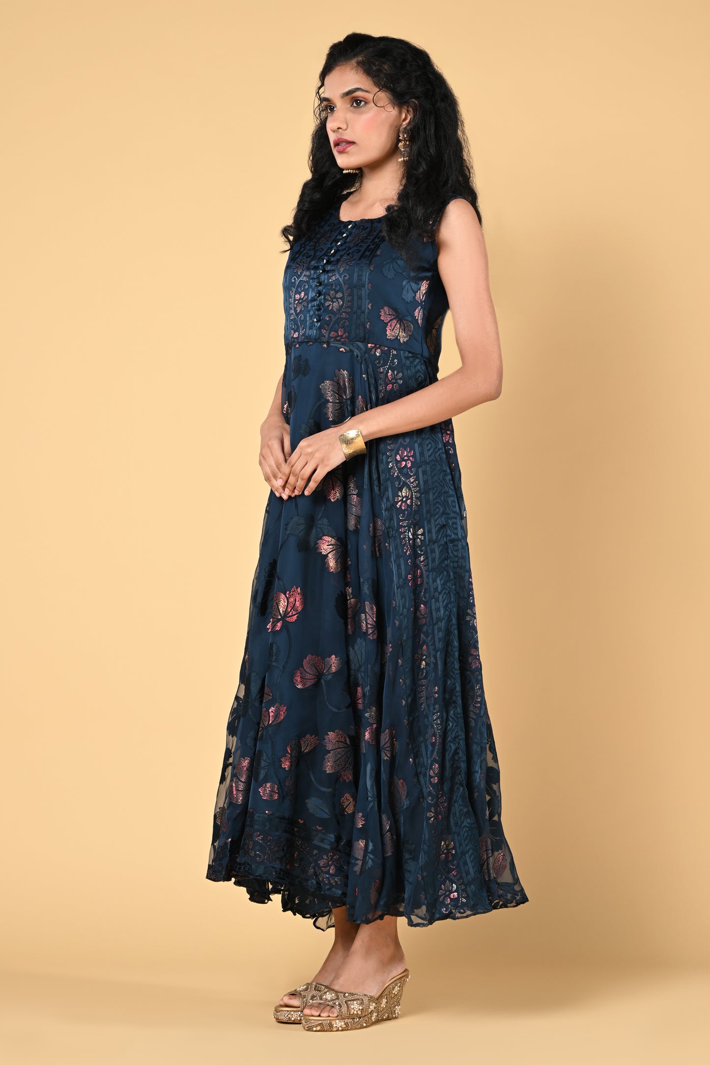 occasion wear peacock blue brasso gown with floral work and round neck