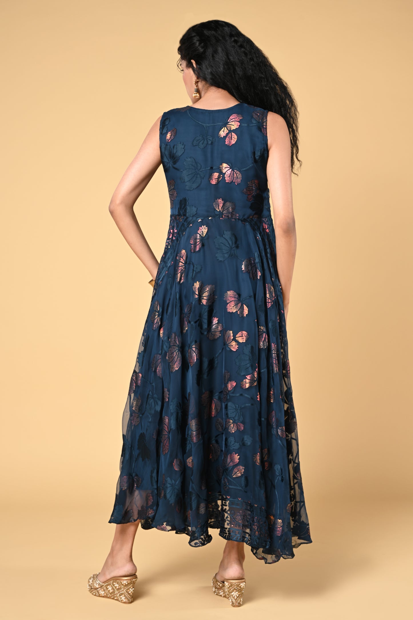 occasion wear peacock blue brasso gown with floral work and round neck