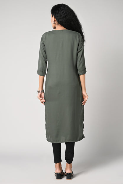 straight cut kurti.
round neck &amp; 3/4 sleeves,
golden buttons in the centre.