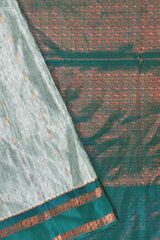 Grey Blue Dupion Slub Body Butta Peacock Border Semi Soft Silk Saree