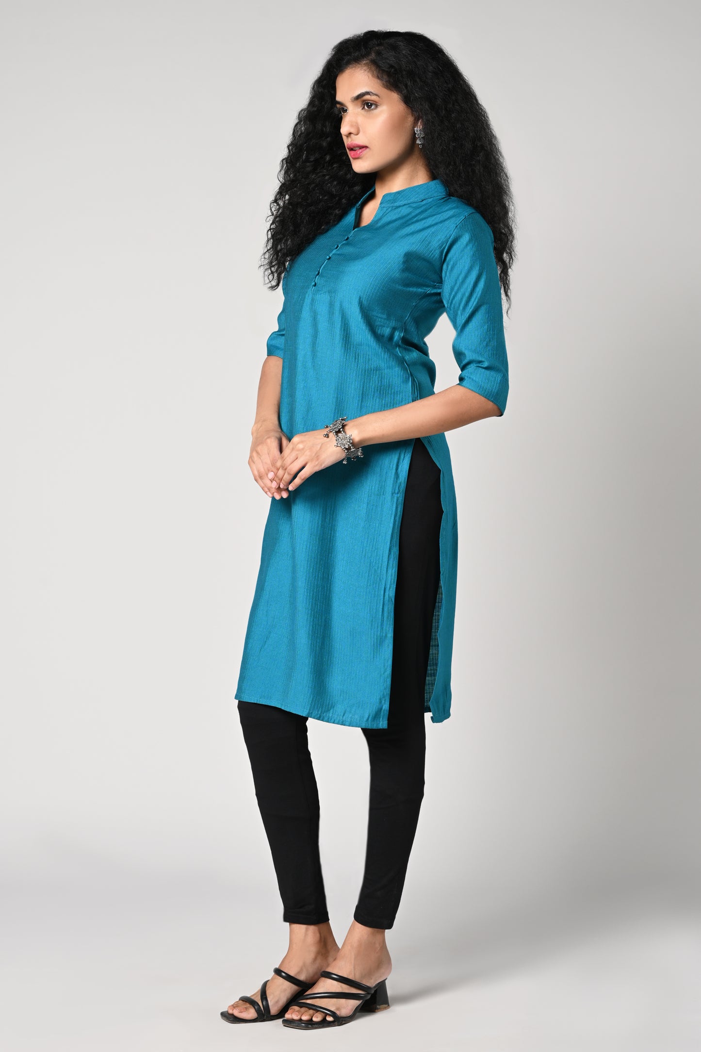 solid plain blue textured straight  Kurti with closed neck and 34 sleeves
