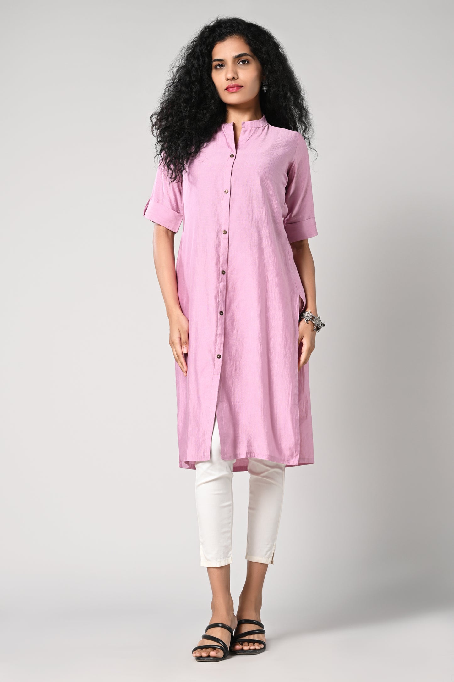 straight cut kurti.
close neck with golden buttons in centre.
elbow sleeves and flap.
all day comfort rayon material.