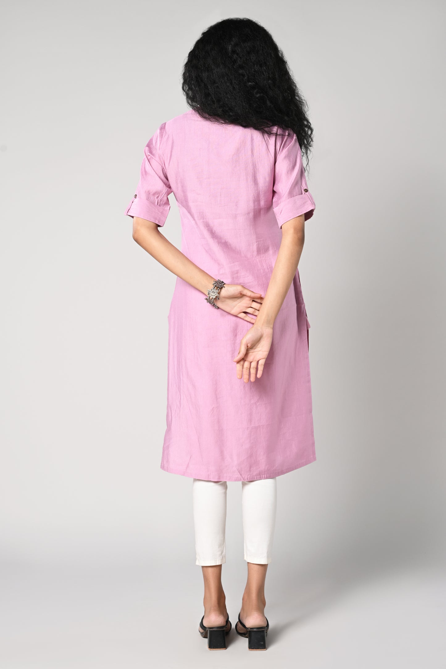 straight cut kurti.
close neck with golden buttons in centre.
elbow sleeves and flap.
all day comfort rayon material.