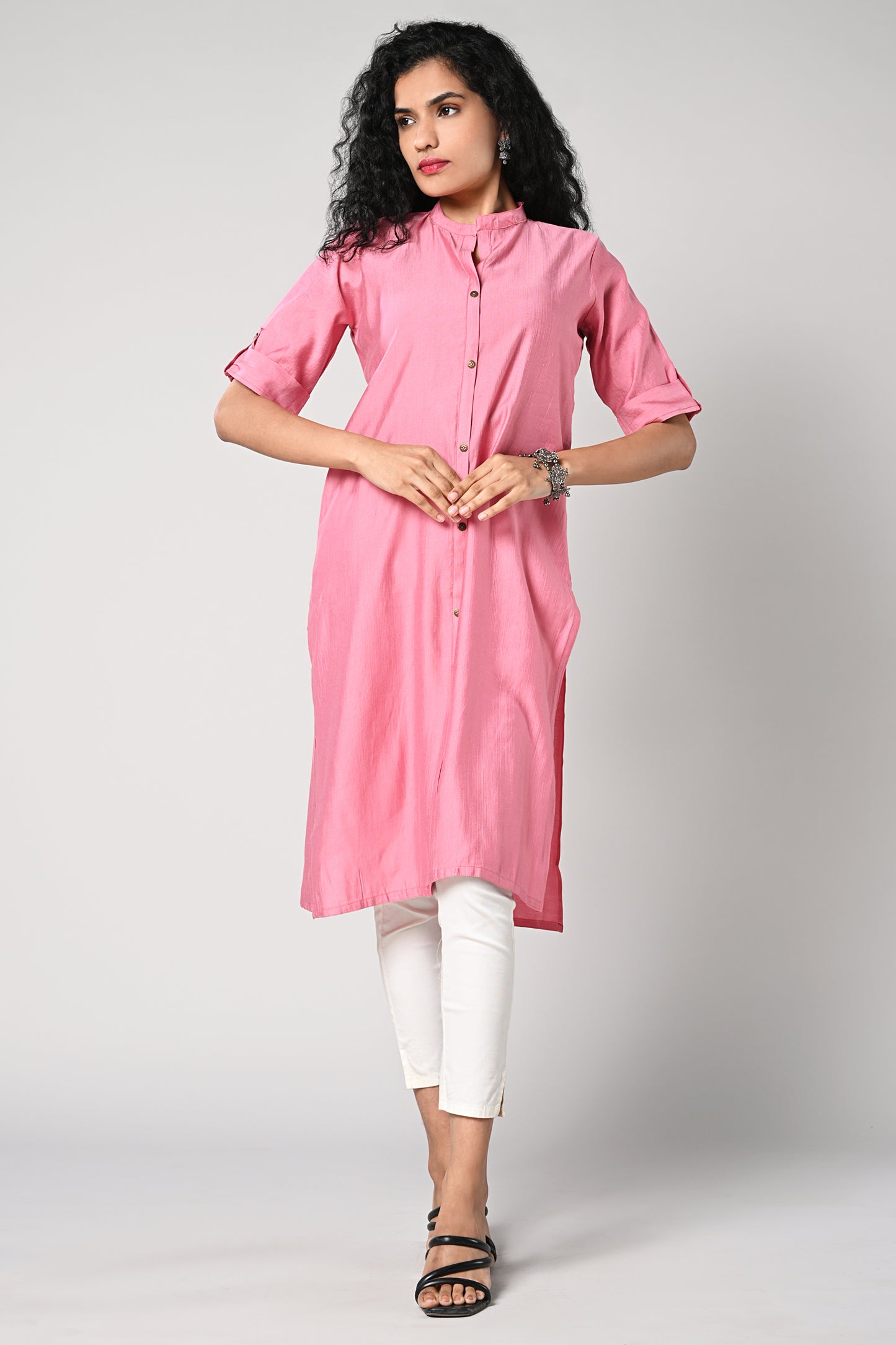 straight cut kurti.
close neck with golden buttons in centre.
elbow sleeves and flap.
all day comfort rayon material.