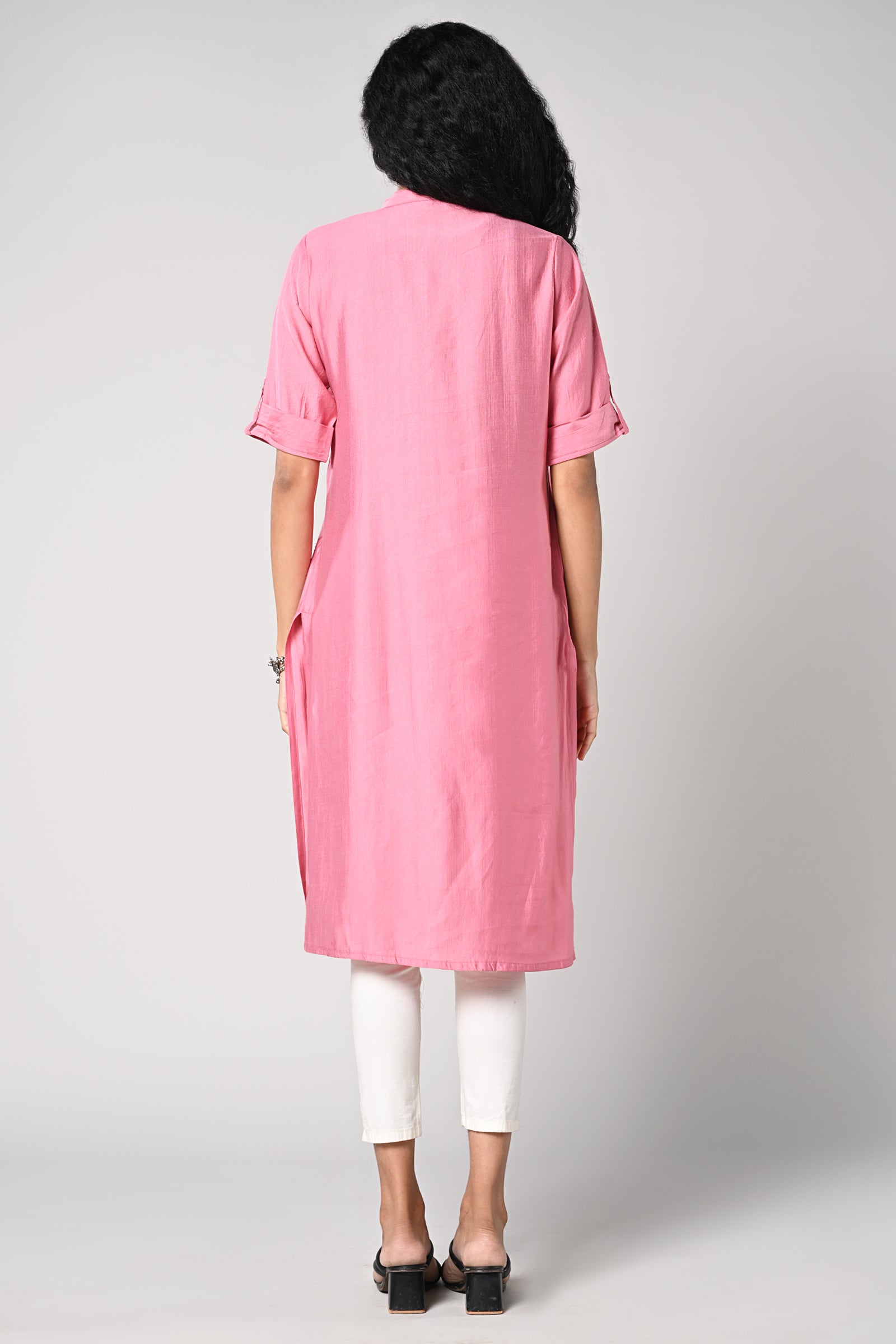 straight cut kurti.
close neck with golden buttons in centre.
elbow sleeves and flap.
all day comfort rayon material.