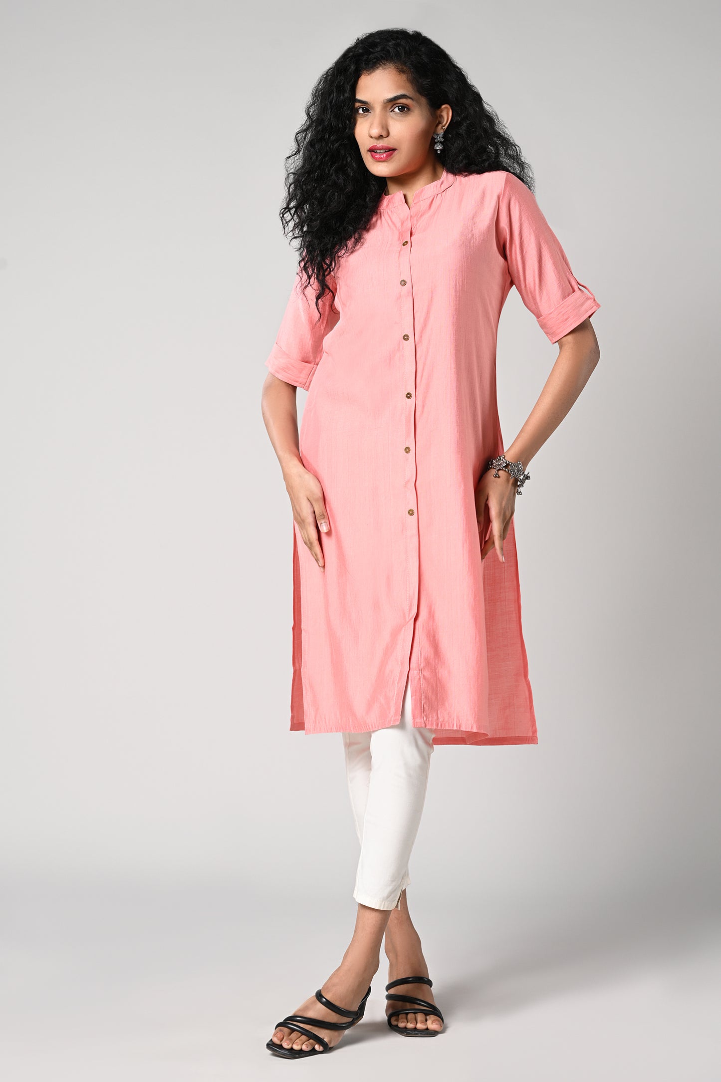 straight cut kurti.
close neck with golden buttons in centre.
elbow sleeves and flap.
all day comfort rayon material.