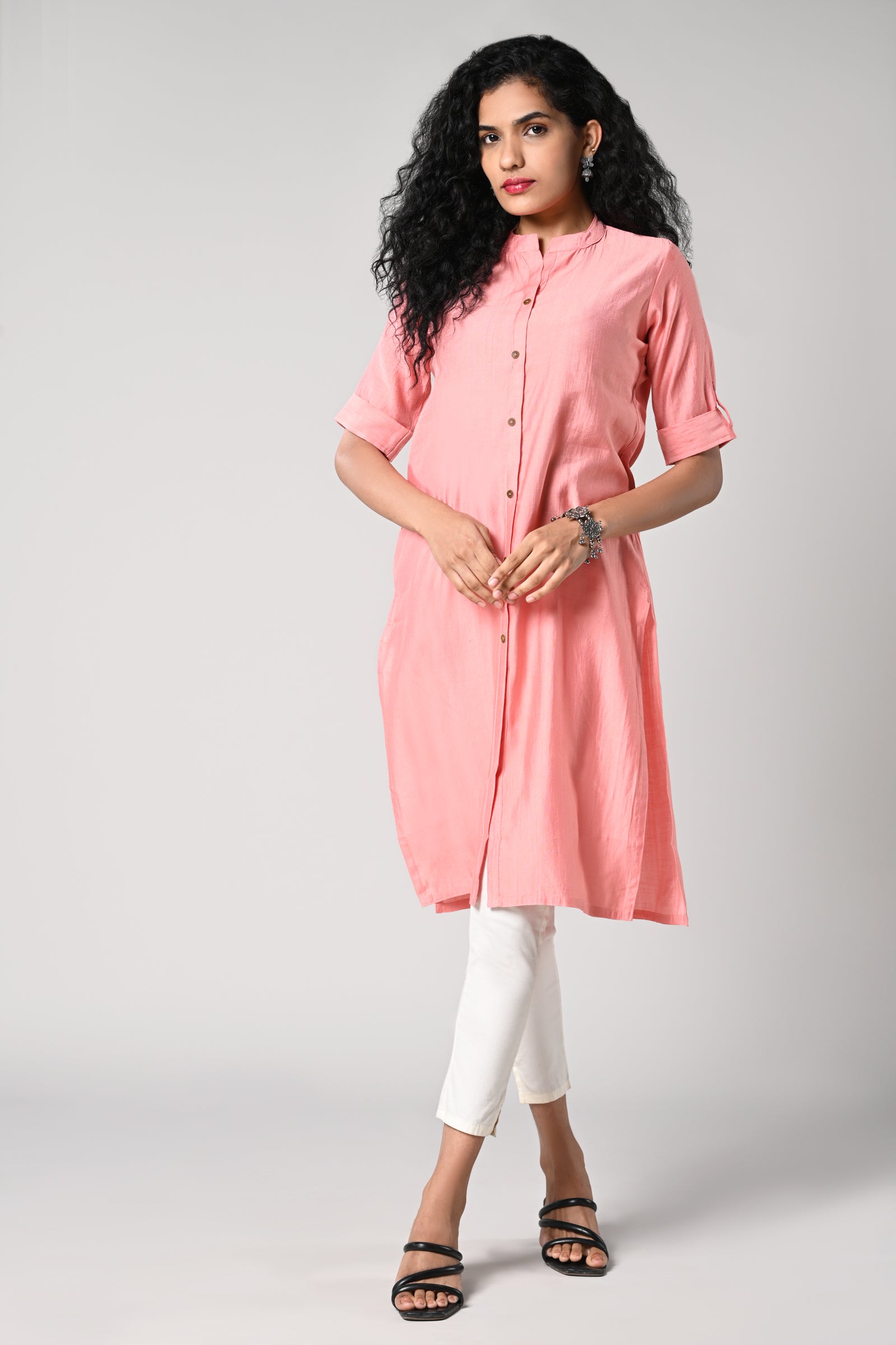 straight cut kurti.
close neck with golden buttons in centre.
elbow sleeves and flap.
all day comfort rayon material.