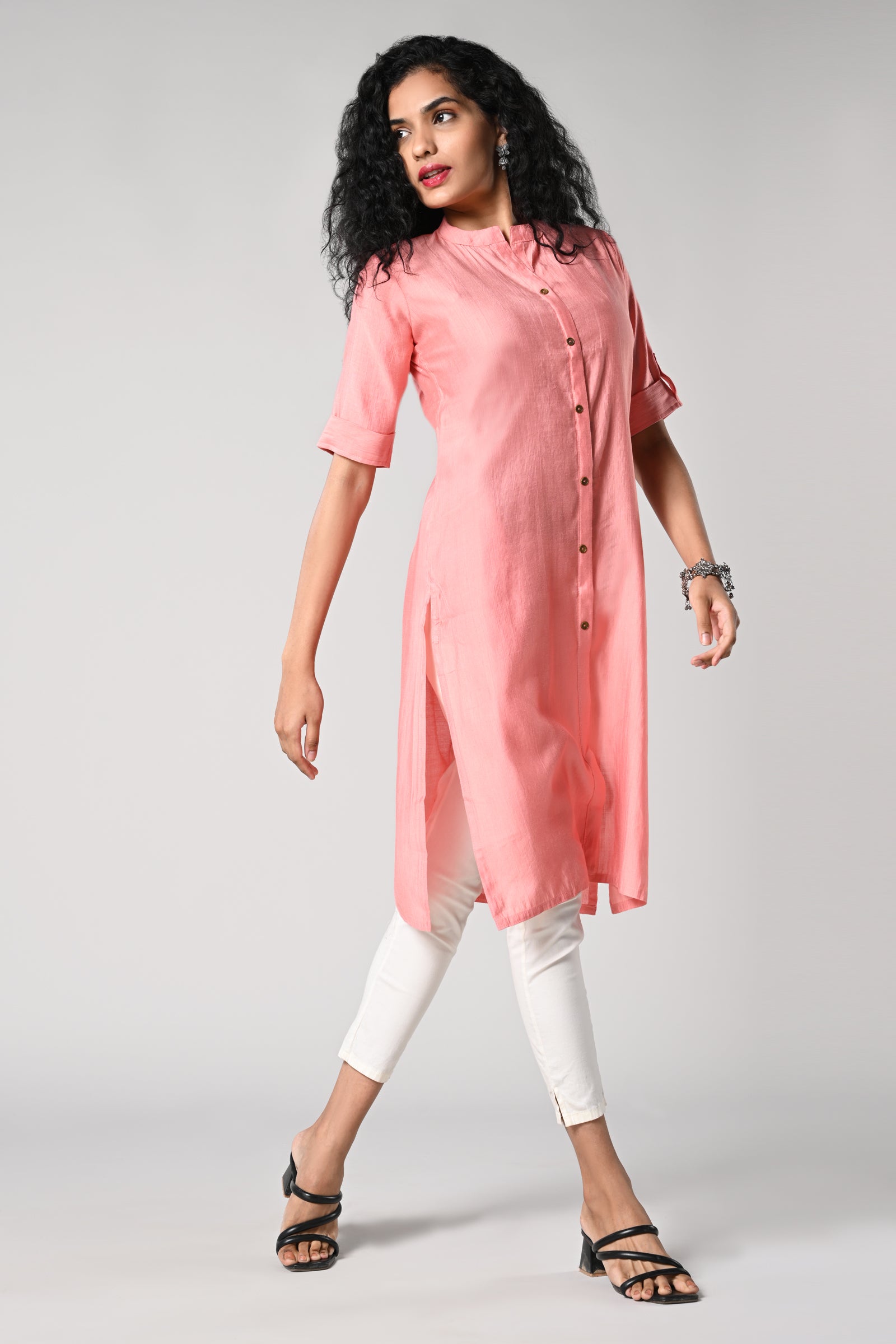 straight cut kurti.
close neck with golden buttons in centre.
elbow sleeves and flap.
all day comfort rayon material.